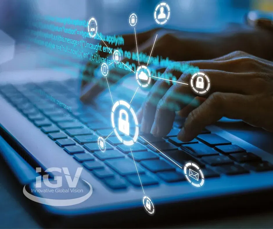 Two hands typing on a computer with code and icon chart floating. IGV logo bottom left.