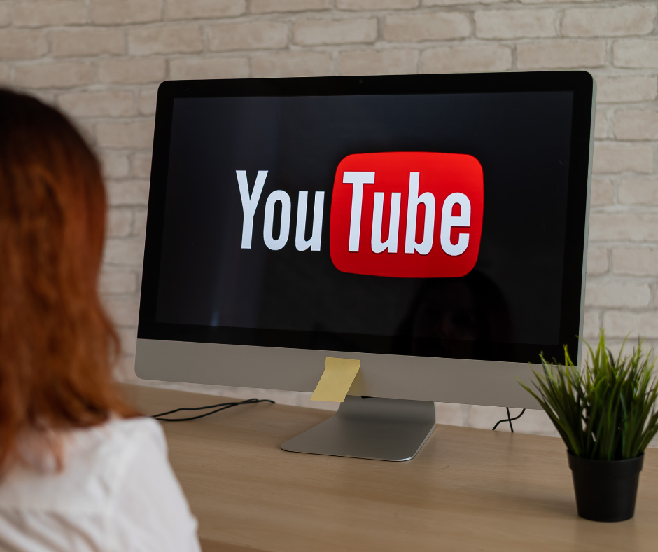 A computer screen with the Youtube logo shown on it.